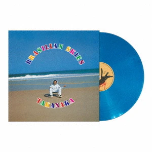 Brasilian Skies album sleeve beside a clear sky-blue vinyl record